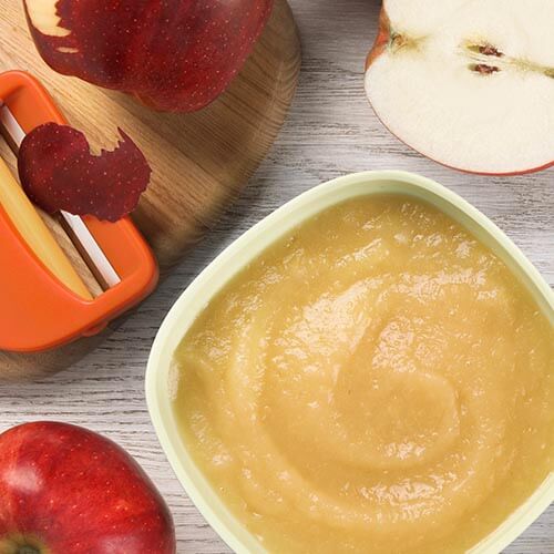 Fruit puree in a dish on a counter.